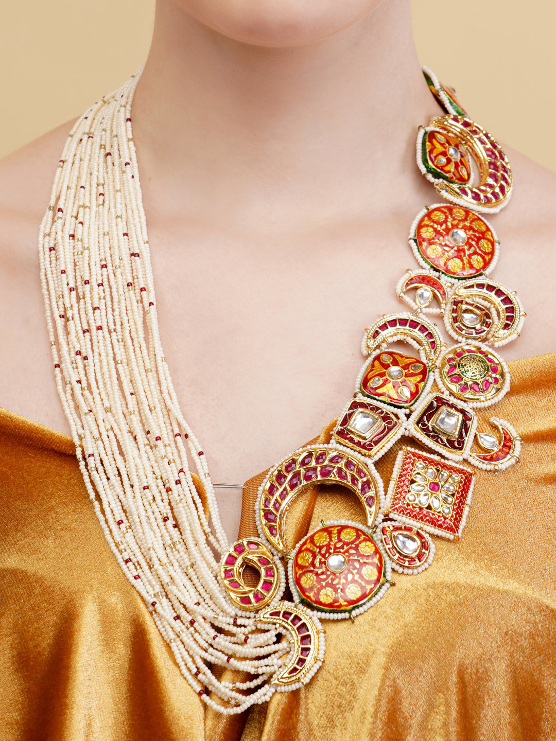 Red and Maroon Designer necklace woith meenakari tikras alsong with kundan tikras joined togather with pearls strings from Dugristyle Ruhaniyat By Dugran