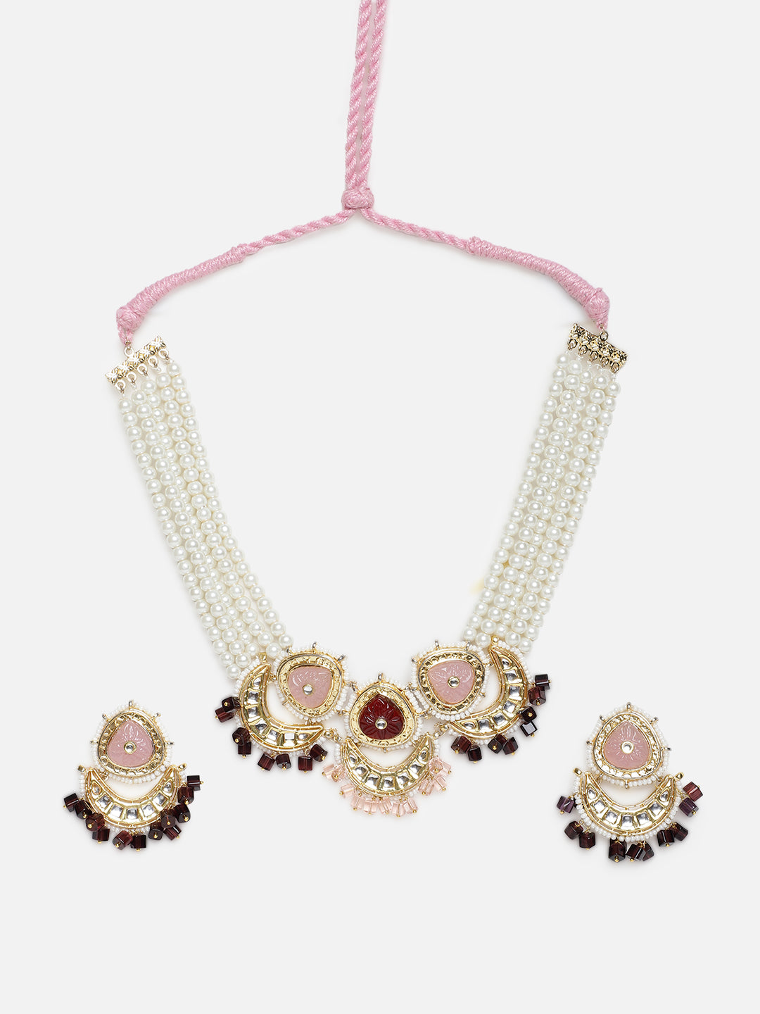 Kundan Jewellery Set with Pearls Strings and Carved Stones