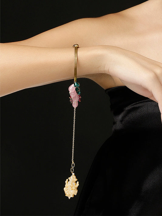 Gold and Cream Ganpathi Watch Charm from Dugristyle Ruhaniyat By Dugran
