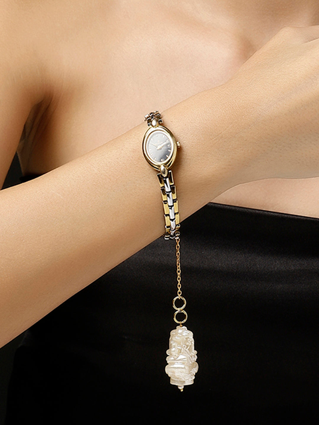 Gold and White Ganpathi Watch Charm from Dugristyle Ruhaniyat By Dugran