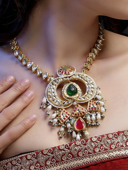 Red and Green Multi shaped Kundan Necklace with Green Carved Stone and small Pearl hangings from Dugristyle Ruhaniyat By Dugran
