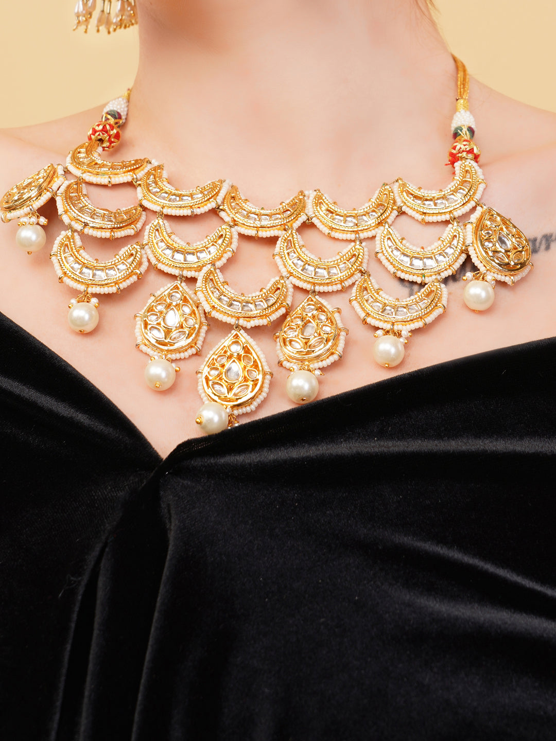 Kundan Necklace with chand shaped tikras brought togather to forma masterpiece