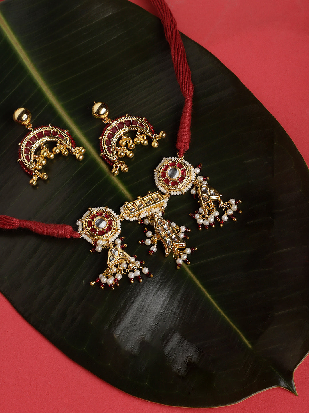 Multi Shaped and Red Colored Kundan Jewellery Set